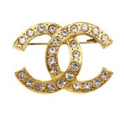 Pre-owned Metal brooches Chanel Vintage , Yellow , Dames