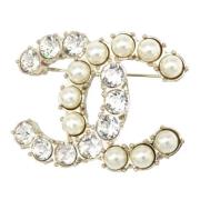 Pre-owned Metal brooches Chanel Vintage , Yellow , Dames