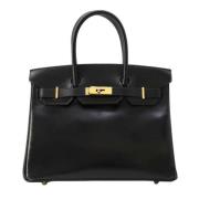 Pre-owned Leather handbags Hermès Vintage , Black , Dames