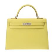 Pre-owned Leather handbags Hermès Vintage , Yellow , Dames