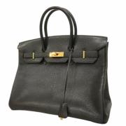 Pre-owned Leather handbags Hermès Vintage , Black , Dames