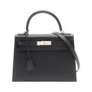 Pre-owned Leather handbags Hermès Vintage , Black , Dames