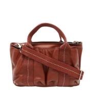 Pre-owned Leather handbags Hermès Vintage , Red , Dames