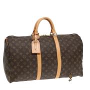 Pre-owned Canvas travel-bags Louis Vuitton Vintage , Brown , Dames