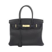 Pre-owned Leather handbags Hermès Vintage , Black , Dames