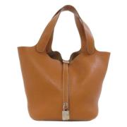 Pre-owned Leather handbags Hermès Vintage , Brown , Dames