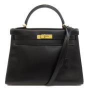 Pre-owned Leather handbags Hermès Vintage , Black , Dames