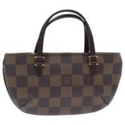 Pre-owned Canvas pouches Louis Vuitton Vintage , Brown , Dames