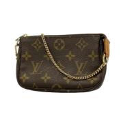 Pre-owned Canvas clutches Louis Vuitton Vintage , Brown , Dames