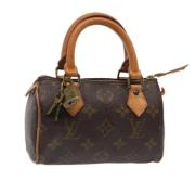 Pre-owned Canvas handbags Louis Vuitton Vintage , Brown , Dames