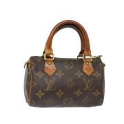 Pre-owned Canvas handbags Louis Vuitton Vintage , Brown , Dames