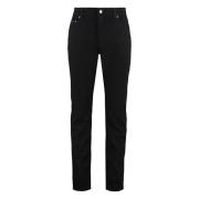 Slim Fit Jeans met Metalen Details Dolce & Gabbana , Black , Heren