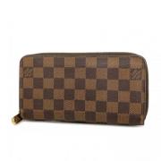 Pre-owned Fabric wallets Louis Vuitton Vintage , Brown , Dames