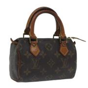 Pre-owned Canvas handbags Louis Vuitton Vintage , Brown , Dames