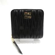 Pre-owned Leather wallets Miu Miu Pre-owned , Black , Dames