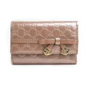 Pre-owned Leather key-holders Gucci Vintage , Beige , Dames