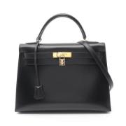 Pre-owned Fabric handbags Hermès Vintage , Black , Dames