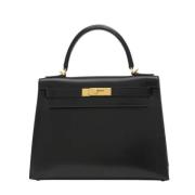 Pre-owned Leather handbags Hermès Vintage , Black , Dames