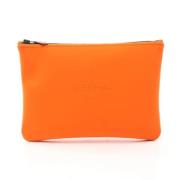 Pre-owned Fabric clutches Hermès Vintage , Orange , Dames