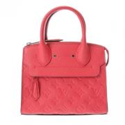 Pre-owned Canvas handbags Louis Vuitton Vintage , Red , Dames