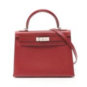 Pre-owned Leather handbags Hermès Vintage , Red , Dames