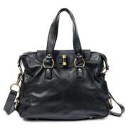 Pre-owned Leather handbags Yves Saint Laurent Vintage , Black , Dames