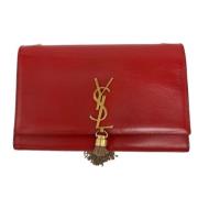 Pre-owned Leather clutches Yves Saint Laurent Vintage , Red , Dames