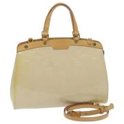 Pre-owned Leather handbags Louis Vuitton Vintage , Beige , Dames