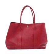 Pre-owned Leather handbags Hermès Vintage , Red , Dames