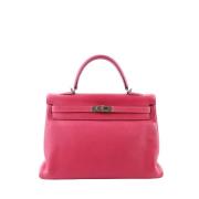 Pre-owned Leather handbags Hermès Vintage , Pink , Dames