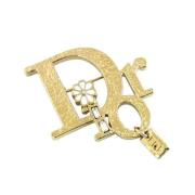 Pre-owned Metal brooches Dior Vintage , Yellow , Heren