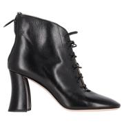 Pre-owned Leather boots Miu Miu Pre-owned , Black , Dames