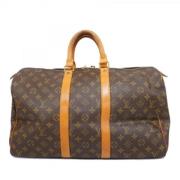 Pre-owned Fabric handbags Louis Vuitton Vintage , Brown , Dames