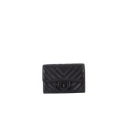 Pre-owned Leather pouches Chanel Vintage , Black , Dames