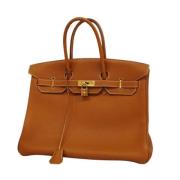 Pre-owned Leather handbags Hermès Vintage , Brown , Dames