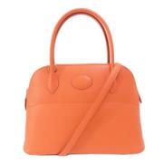 Pre-owned Leather handbags Hermès Vintage , Orange , Dames