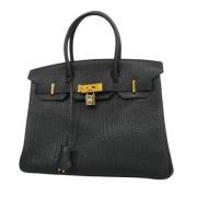 Pre-owned Leather handbags Hermès Vintage , Black , Dames