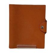 Pre-owned Leather home-office Hermès Vintage , Orange , Unisex