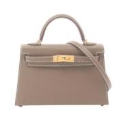 Pre-owned Leather handbags Hermès Vintage , Brown , Dames