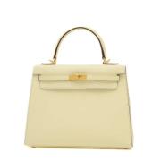 Pre-owned Leather handbags Hermès Vintage , Beige , Dames