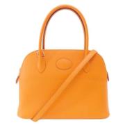 Pre-owned Leather handbags Hermès Vintage , Orange , Dames