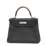 Pre-owned Leather handbags Hermès Vintage , Black , Dames