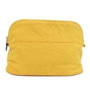 Pre-owned Cotton clutches Hermès Vintage , Yellow , Dames