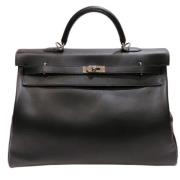 Pre-owned Leather handbags Hermès Vintage , Black , Dames