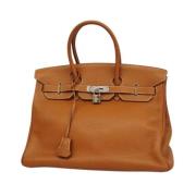 Pre-owned Leather handbags Hermès Vintage , Brown , Dames