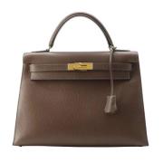 Pre-owned Leather handbags Hermès Vintage , Brown , Dames