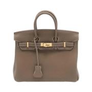 Pre-owned Leather handbags Hermès Vintage , Beige , Dames