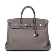 Pre-owned Leather handbags Hermès Vintage , Gray , Dames