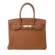 Pre-owned Leather handbags Hermès Vintage , Brown , Dames