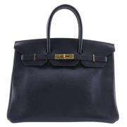 Pre-owned Leather handbags Hermès Vintage , Black , Dames